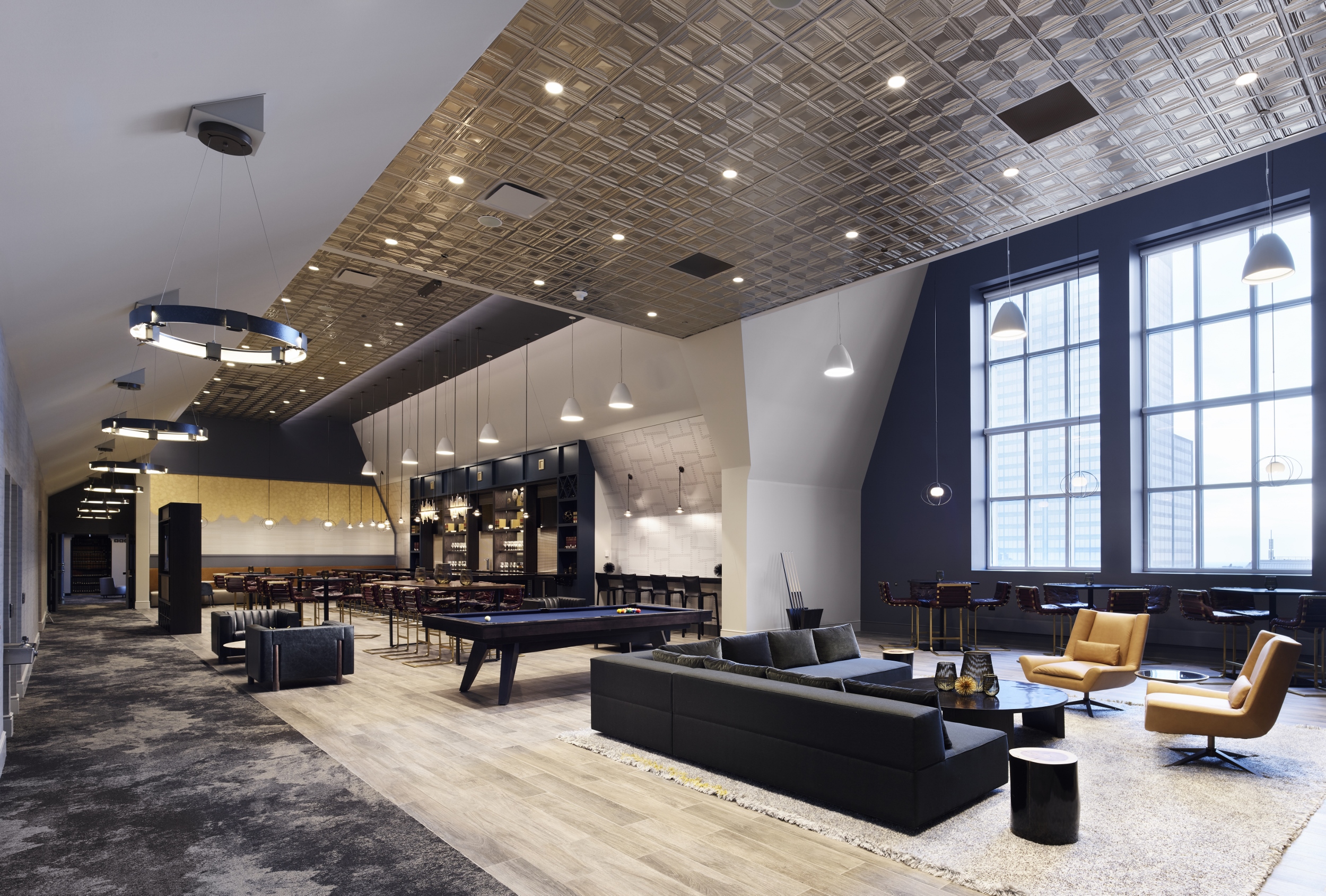 Amenity space with siting area, pool, and cafe - The Stacks.