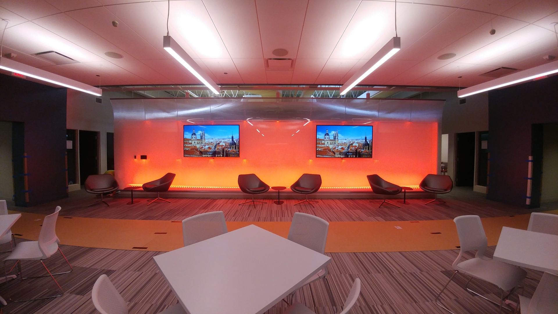 Sitting and collaboration area, with media screens, AANS.