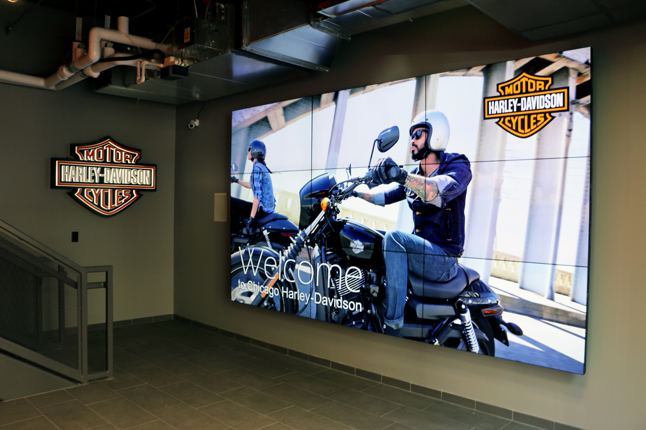 Large media screen at Harley Davidson.